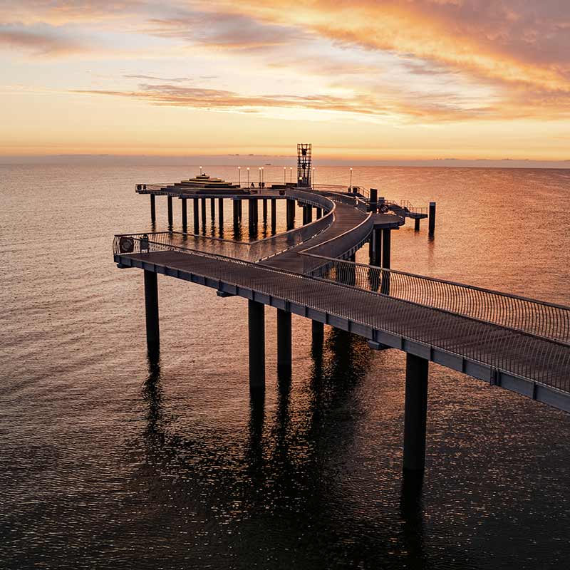 Seebrücke Koserow Sonnenuntergang ruhige Ostsee Meer oranger Himmel Insel Usedom